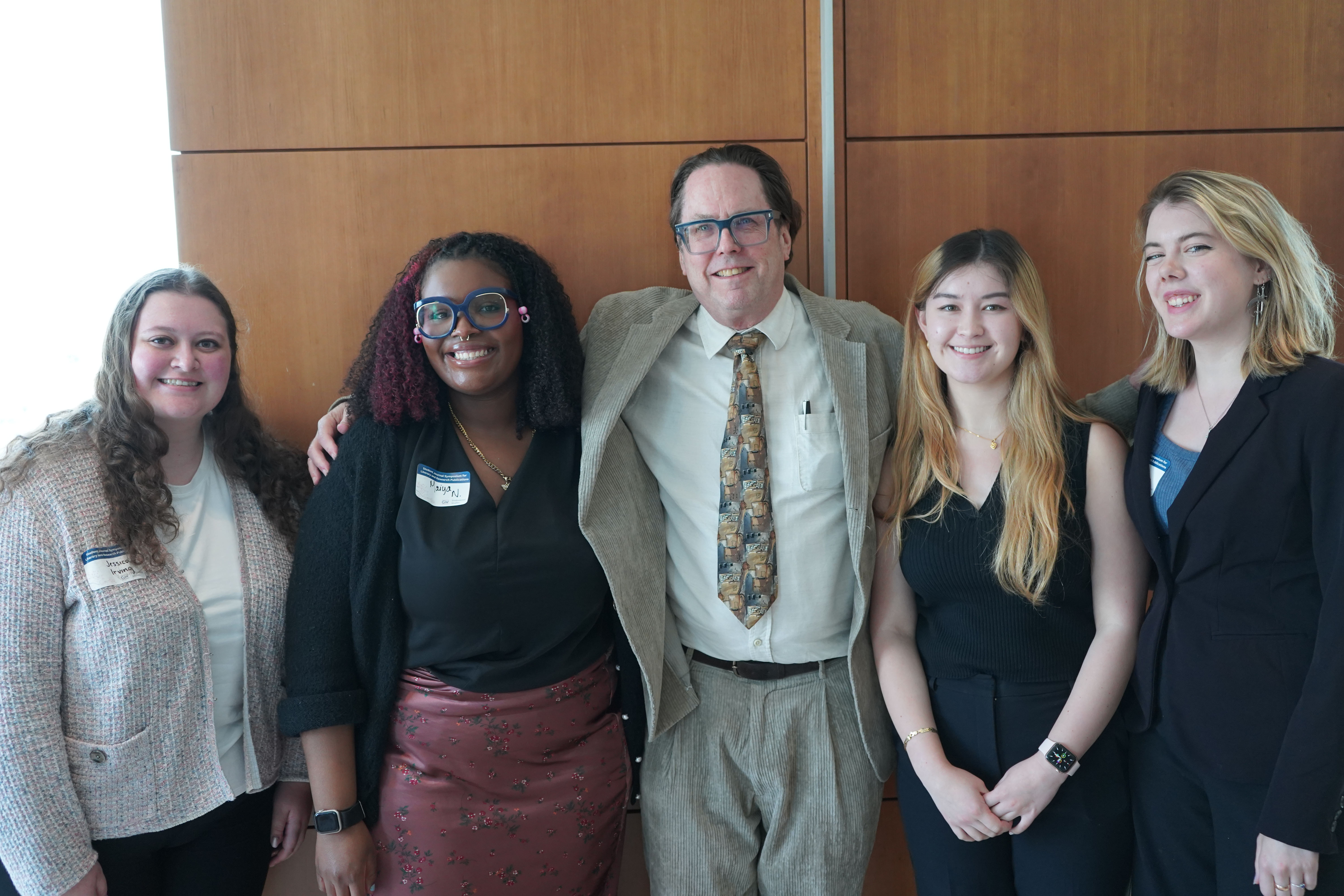 Amelia, Breanna, Maiya, and Jessica with John Warren