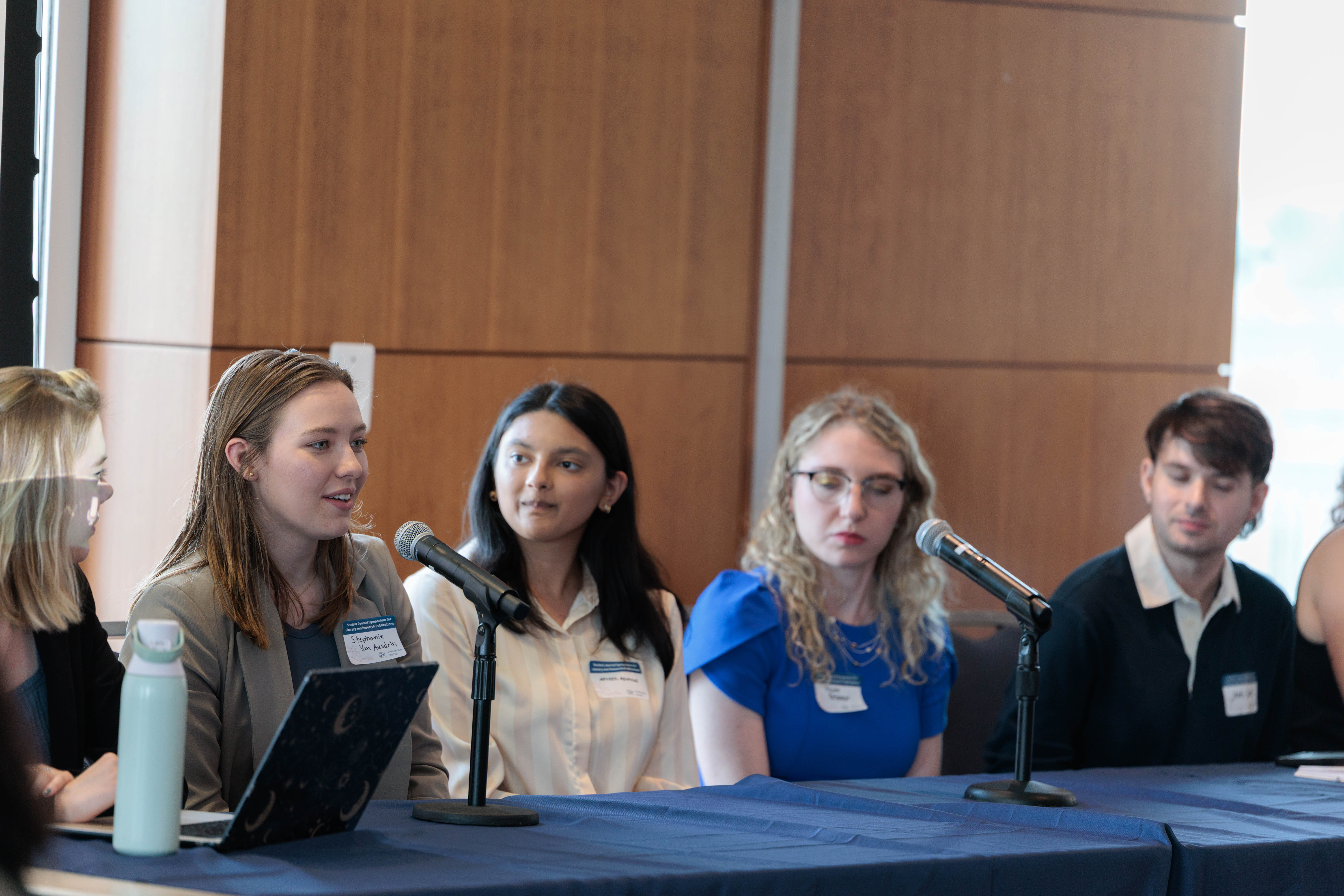 students presenting at the symposium